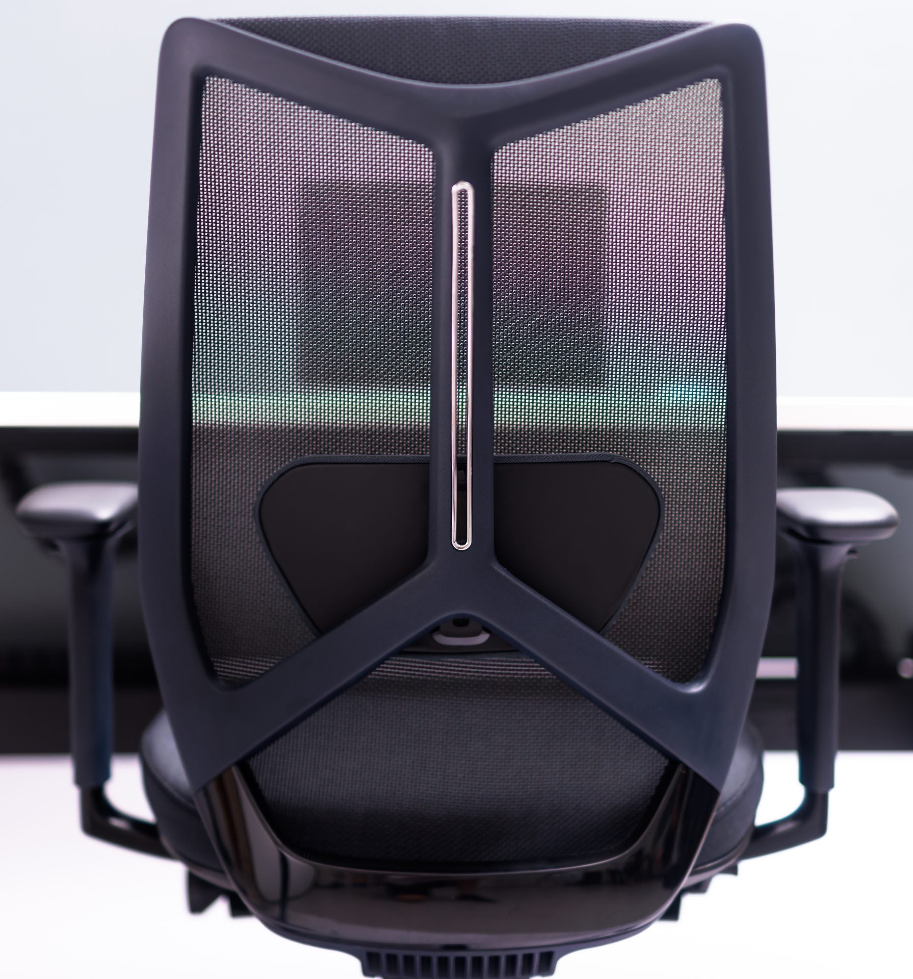 Black ARCO Chair positioned for workstation seating hire
