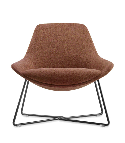 Lutie Cross Lounge Chair Hire in rust - angled view